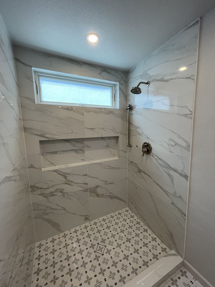 Vein-Matched Shower by South Bay Tile